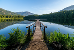 Charger l'image dans la galerie, Daylight version of the wooden dock, lake, and mountains
